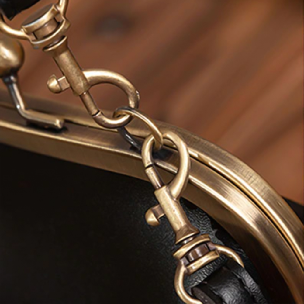 Margareta – Vintage Kussverschluss Schultertasche