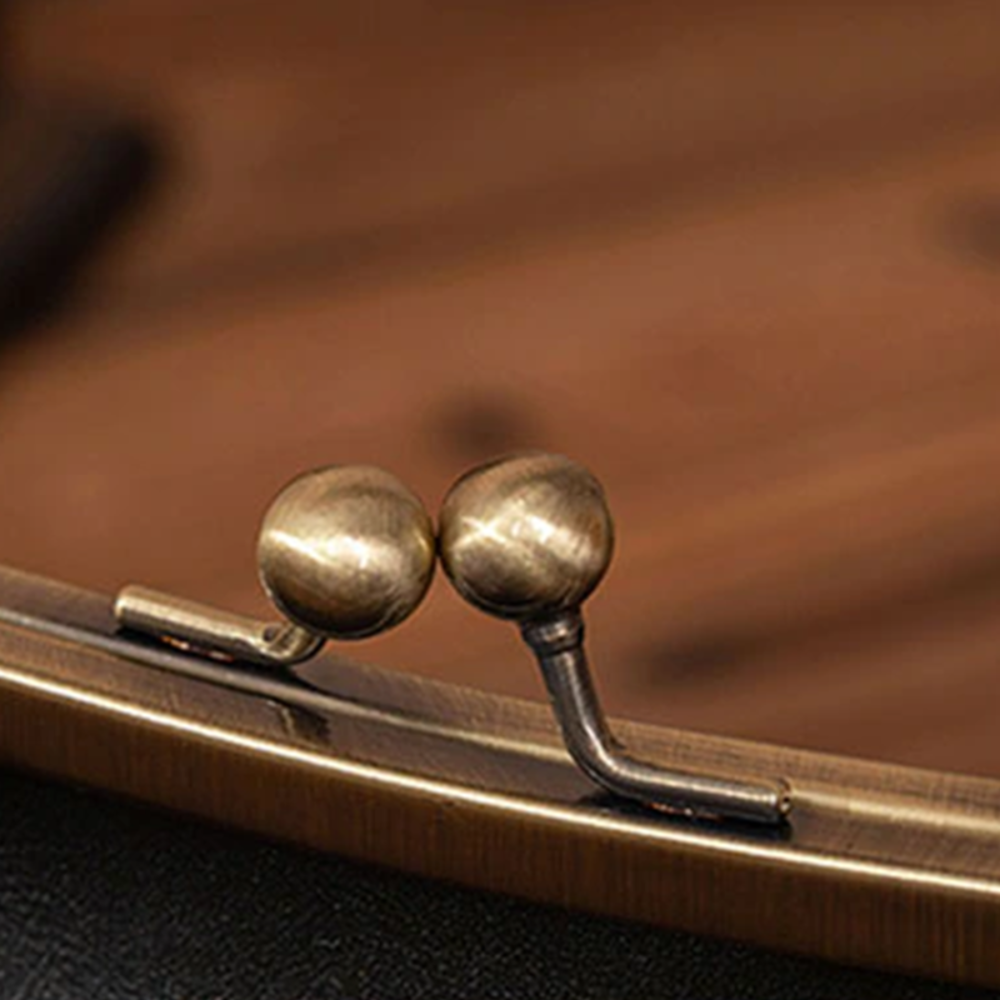 Margareta – Vintage Kussverschluss Schultertasche