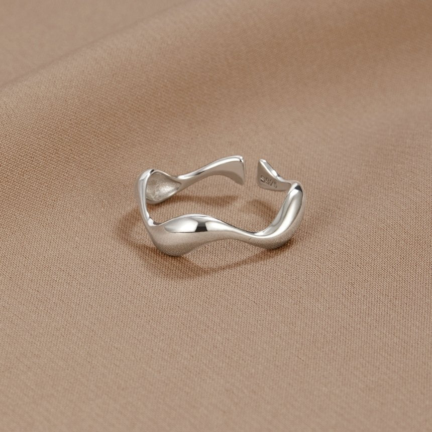 Adjustable Silver Ring with Wave Pattern